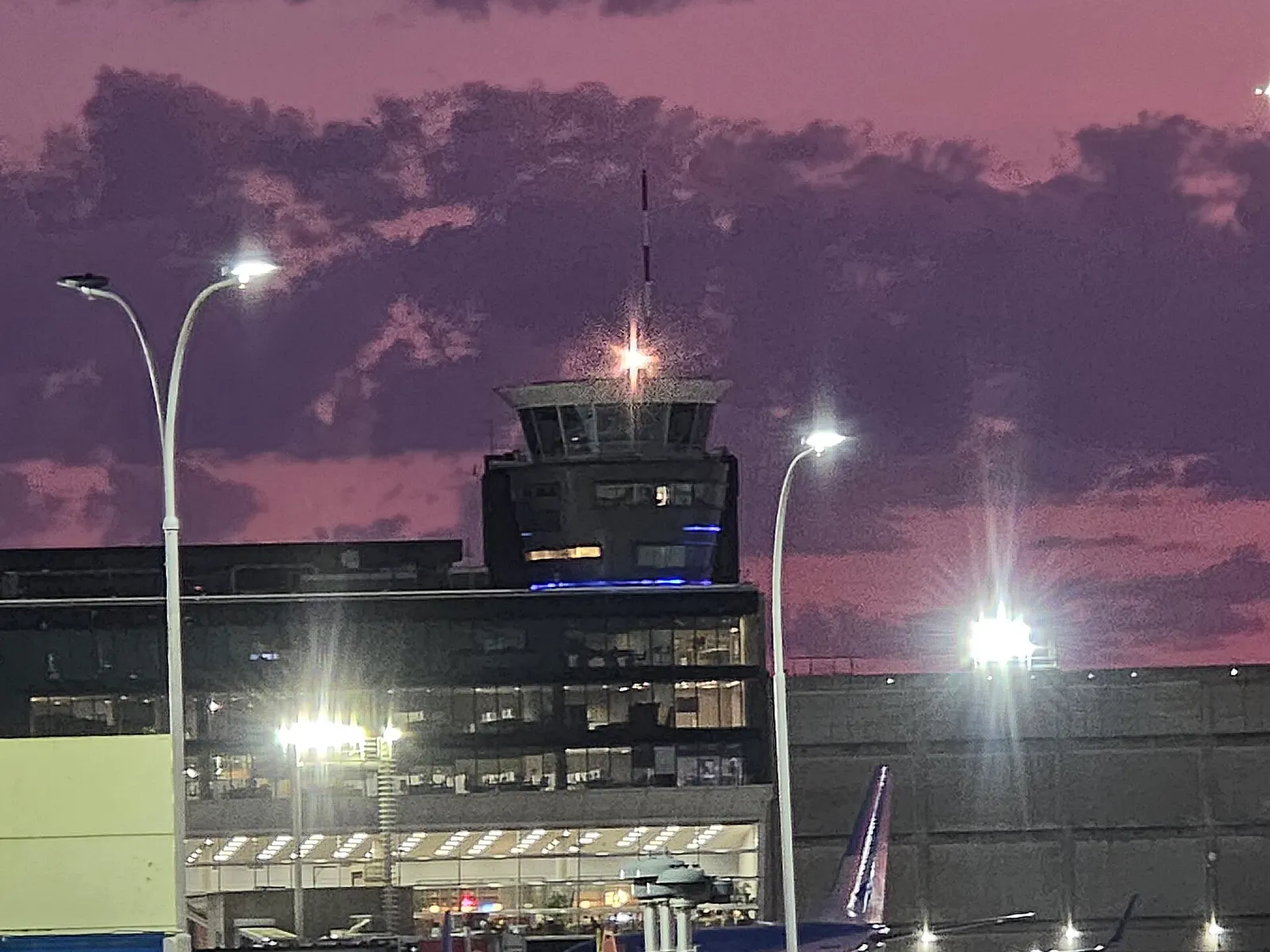 Air Traffic Control (ATC) tower of Aeroparque Jorge Newbery (IATA: AEP, ICAO: SABE), Buenos Aires, Argentina. The photo shows the modern 35-meter-high tower inaugurated in 2018, with its glazed control cab and approach l.