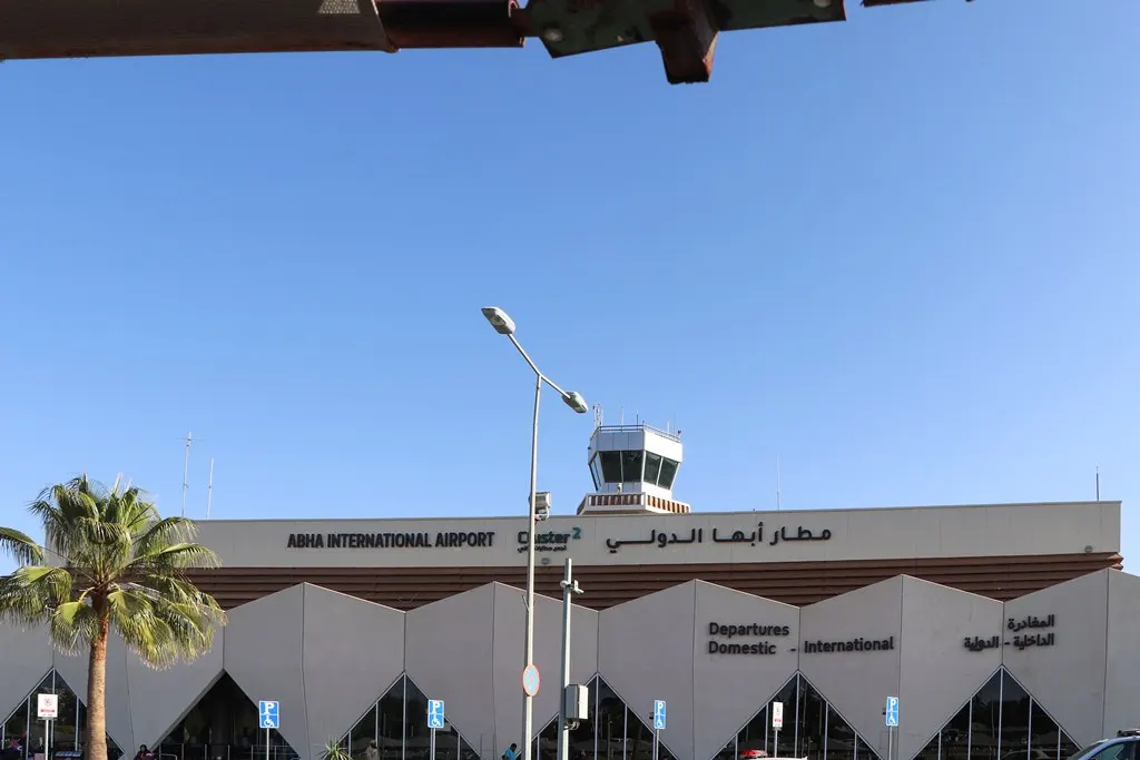 Abha International Airport passenger hall and apron, photographed 1 February 2026