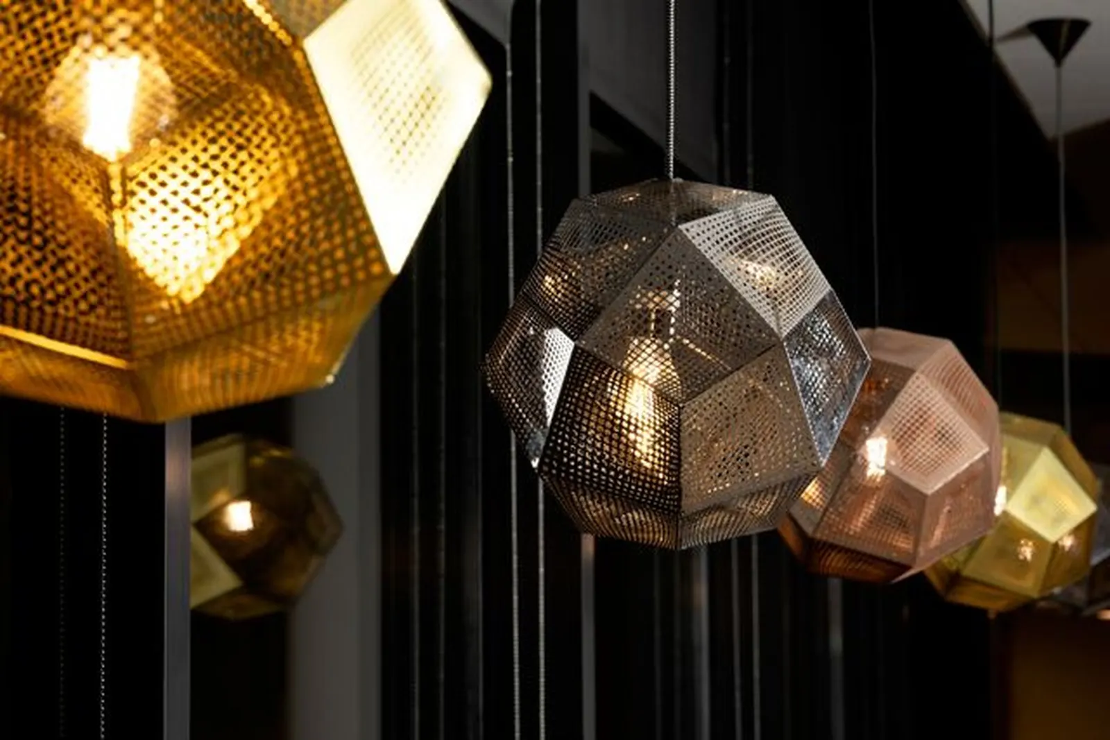 Geometric pendant lighting in the Escape Lounge at Bradley International Airport (BDL).