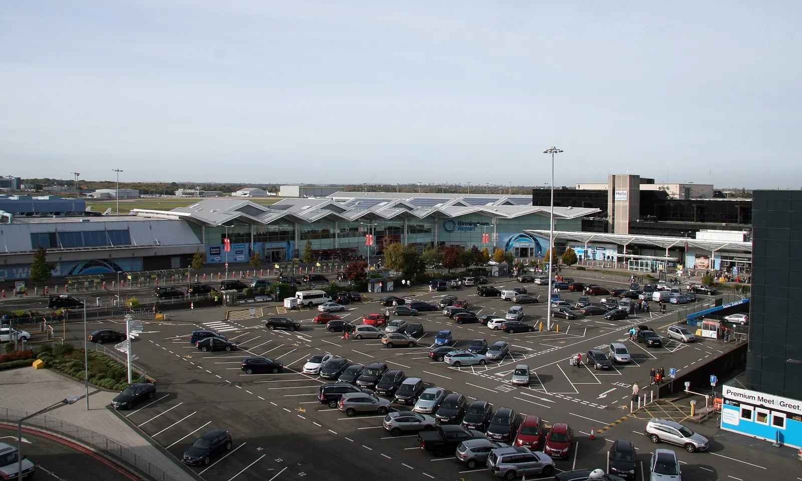 Birmingham Airport passenger terminal exterior with the current BHX branding and forecourt