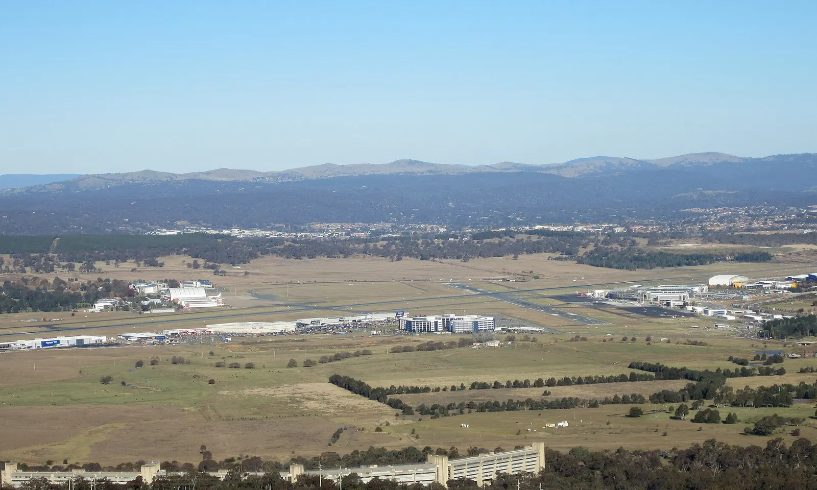 Canberra Airport viewed from Mount Ainslie in May 2012. The new terminal buildings are under construction.