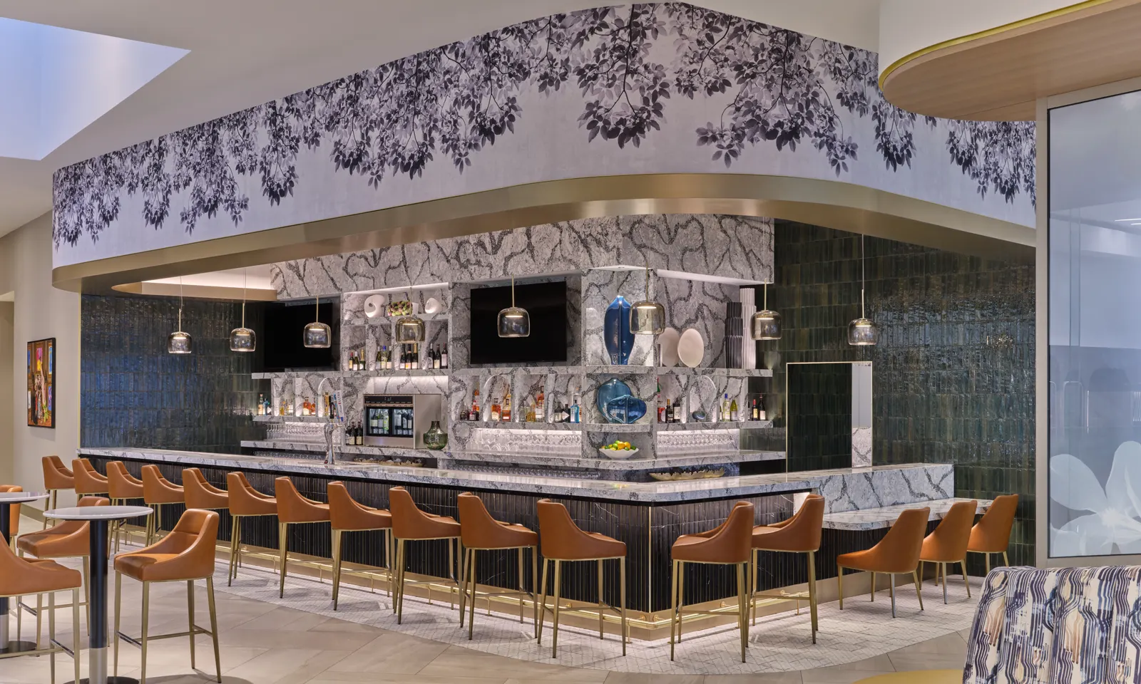 Bar with floral accents in the Delta Sky Club at Charlotte Douglas Concourse A (CLT).