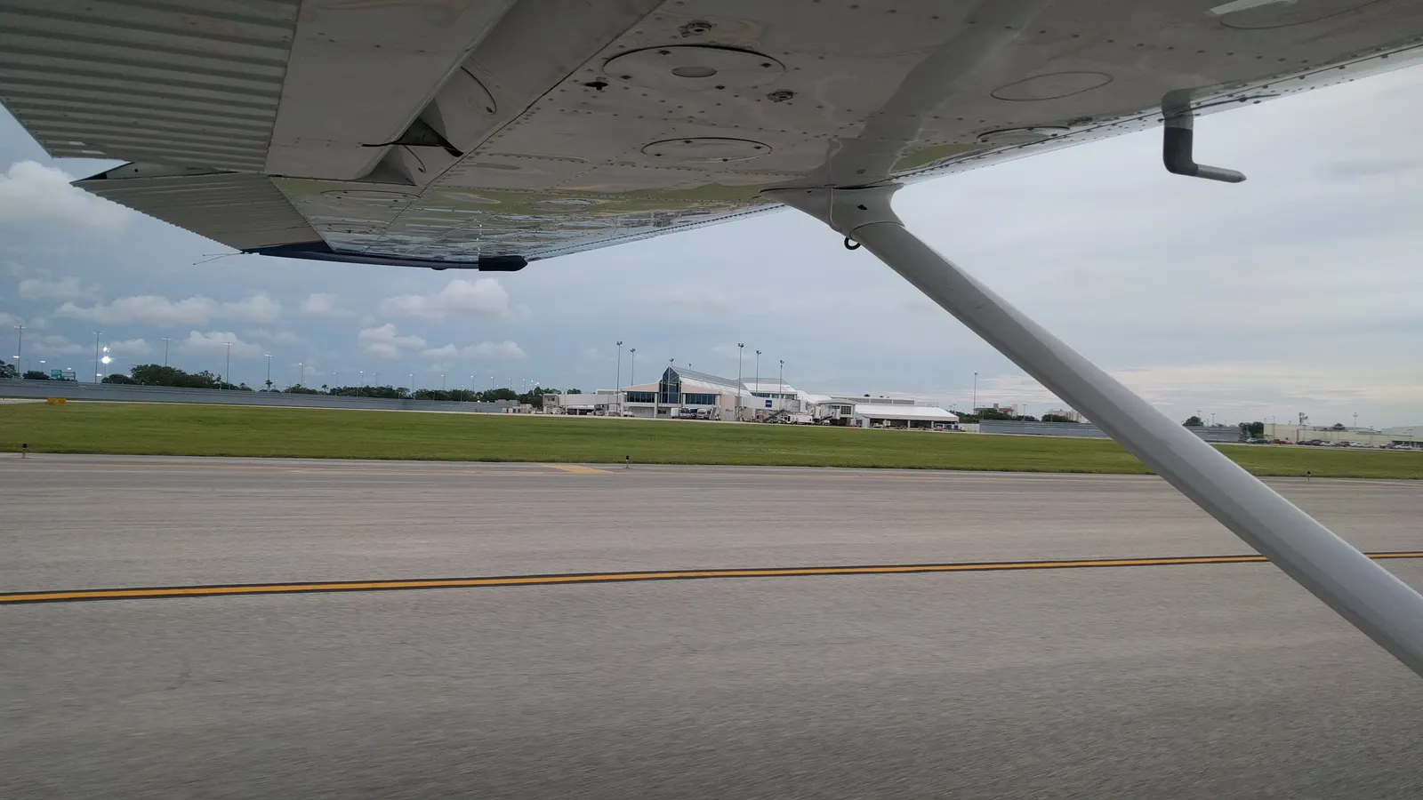 Historic 2017 view of the Daytona Beach International Airport passenger terminal from a Cessna 172