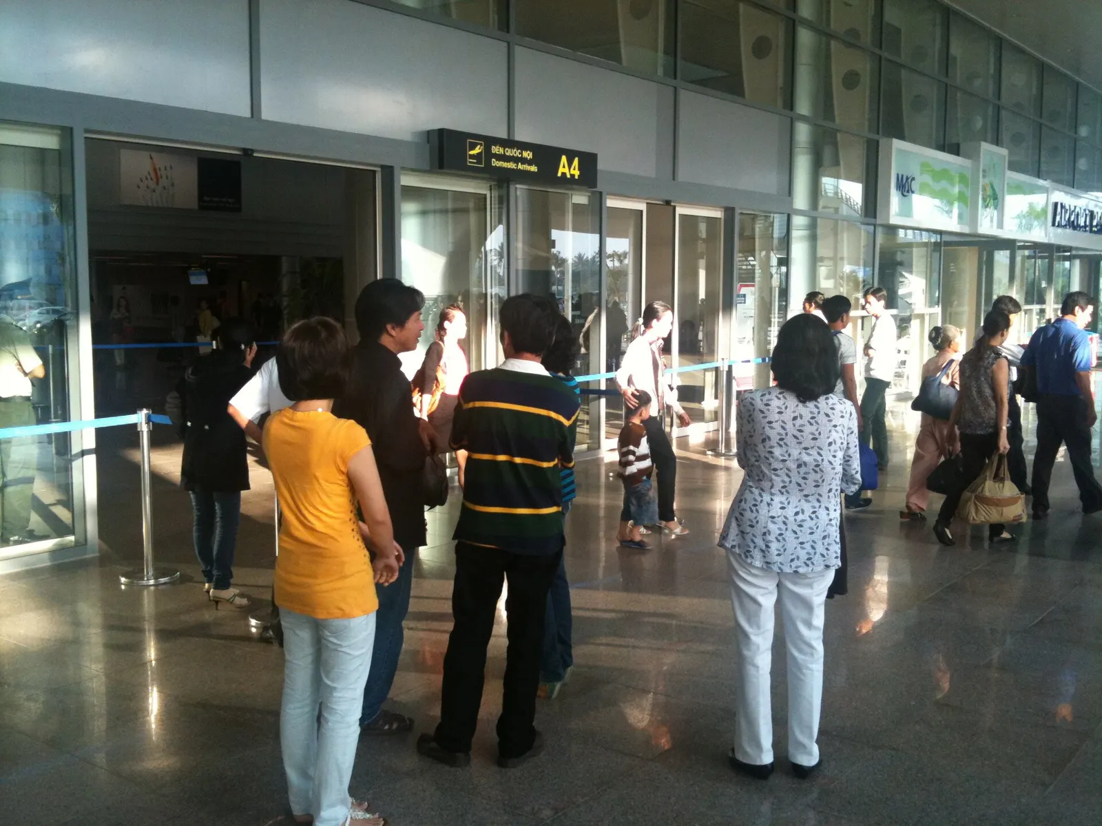 Passengers wait outside the arrivals doors of Da Nang International Airport’s then-new terminal in 2012.