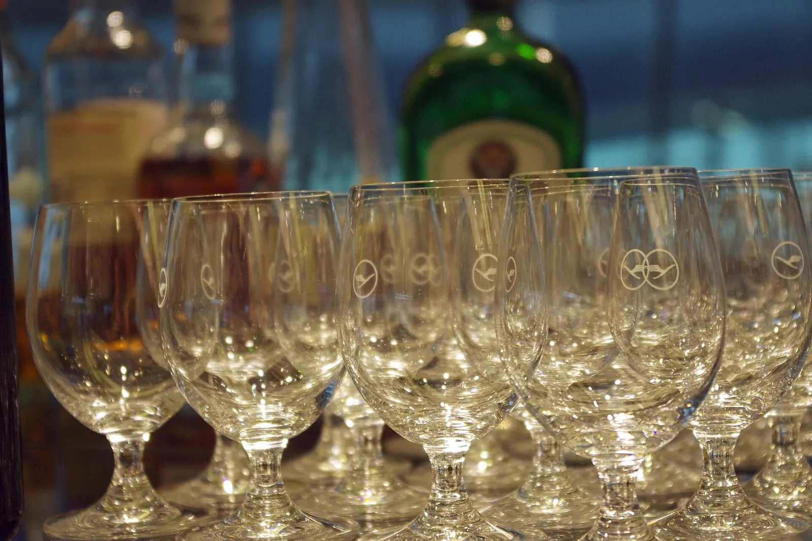 Bar glassware lined up on a counter inside the Lufthansa Business Lounge at Frankfurt Airport (FRA).