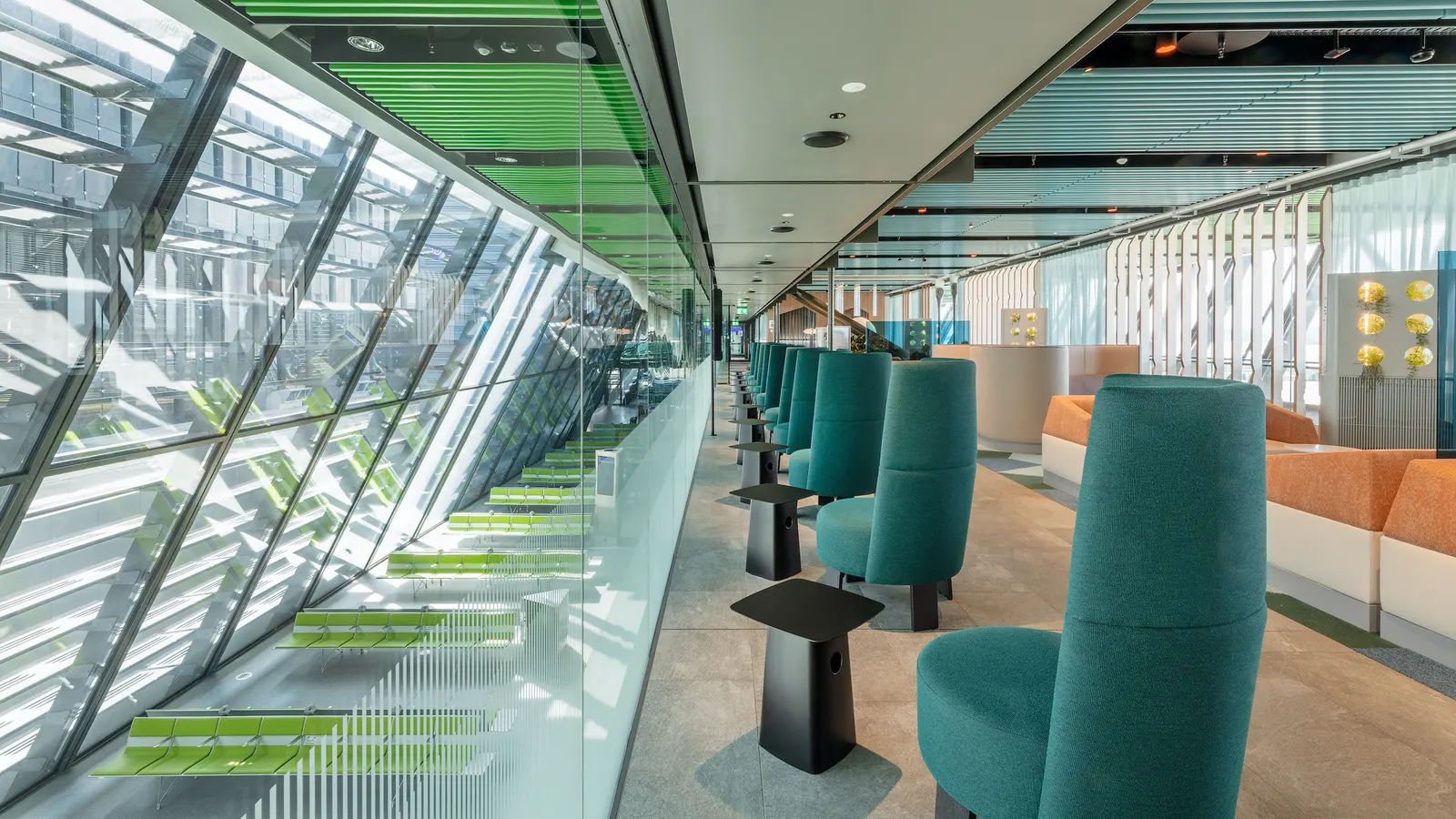 High-back window seating in the Crystal Lounge by Aspire at Geneva Airport (GVA).