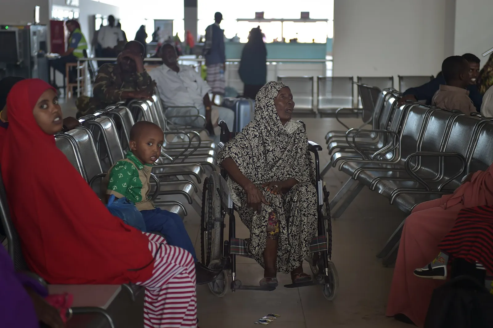 A woman sits in her wheelchair in the departures terminal of Mogadishu's Aden Adde International Airport in Somalia on April 19. After an explosion ripped a hole in the side of a Daalo Airline's airplane in February of 2016, security at Aden Adde International Airport has been drastically revamped i