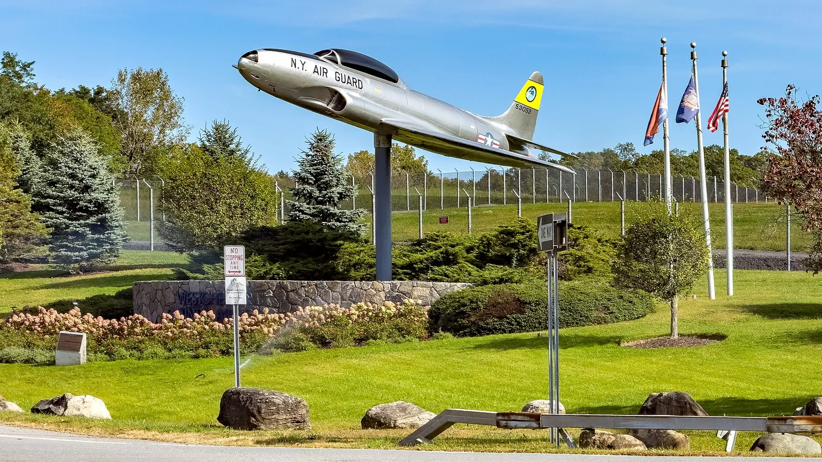 October 2025 entrance signage at Westchester County Airport (HPN) on a clear afternoon.