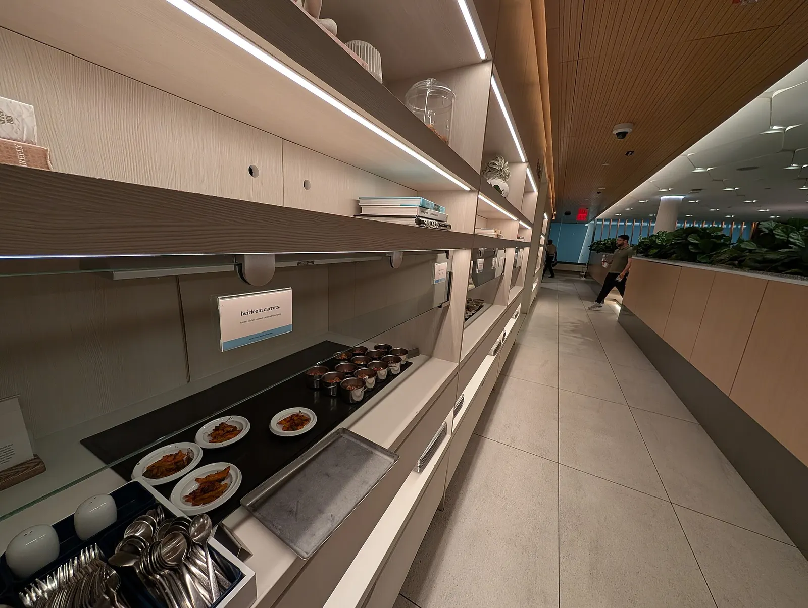 The buffet line at the Capital One Lounge inside Dulles Airport. The dish closest tot he camera is Heirloom carrots. Main Terminal, Dulles Airport, 1 Saarinen Circle, Dulles, Virginia 20166.