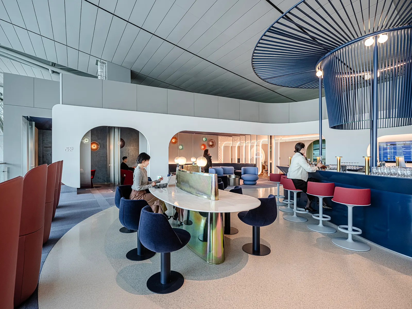 Guests use seating inside the oneworld lounge at Seoul Incheon Airport.