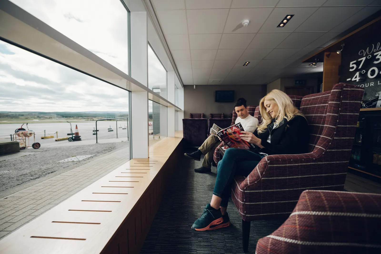 Window seating in the Aspire Lounge at Inverness Airport (INV).