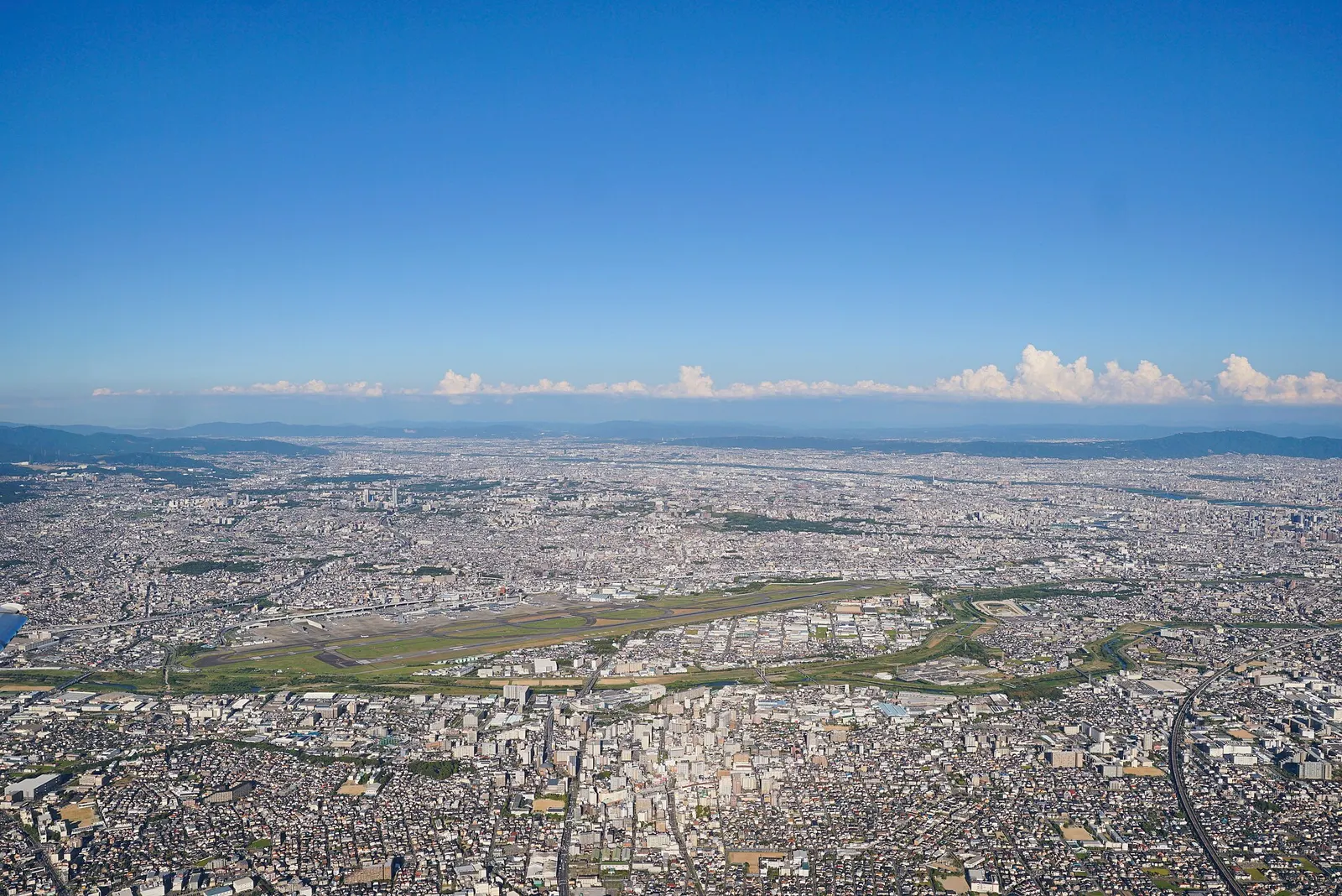 Aerial of Osaka Itami Airport on 1 September 2025, seen from JAL flight 2179 departing for Akita