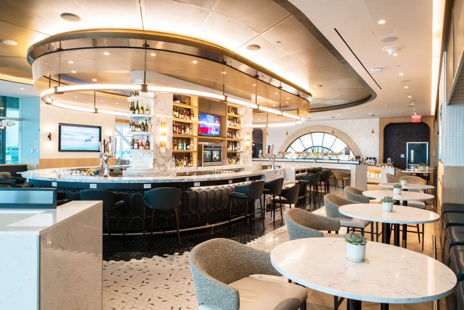 Circular premium bar at the Delta Sky Club at JFK.