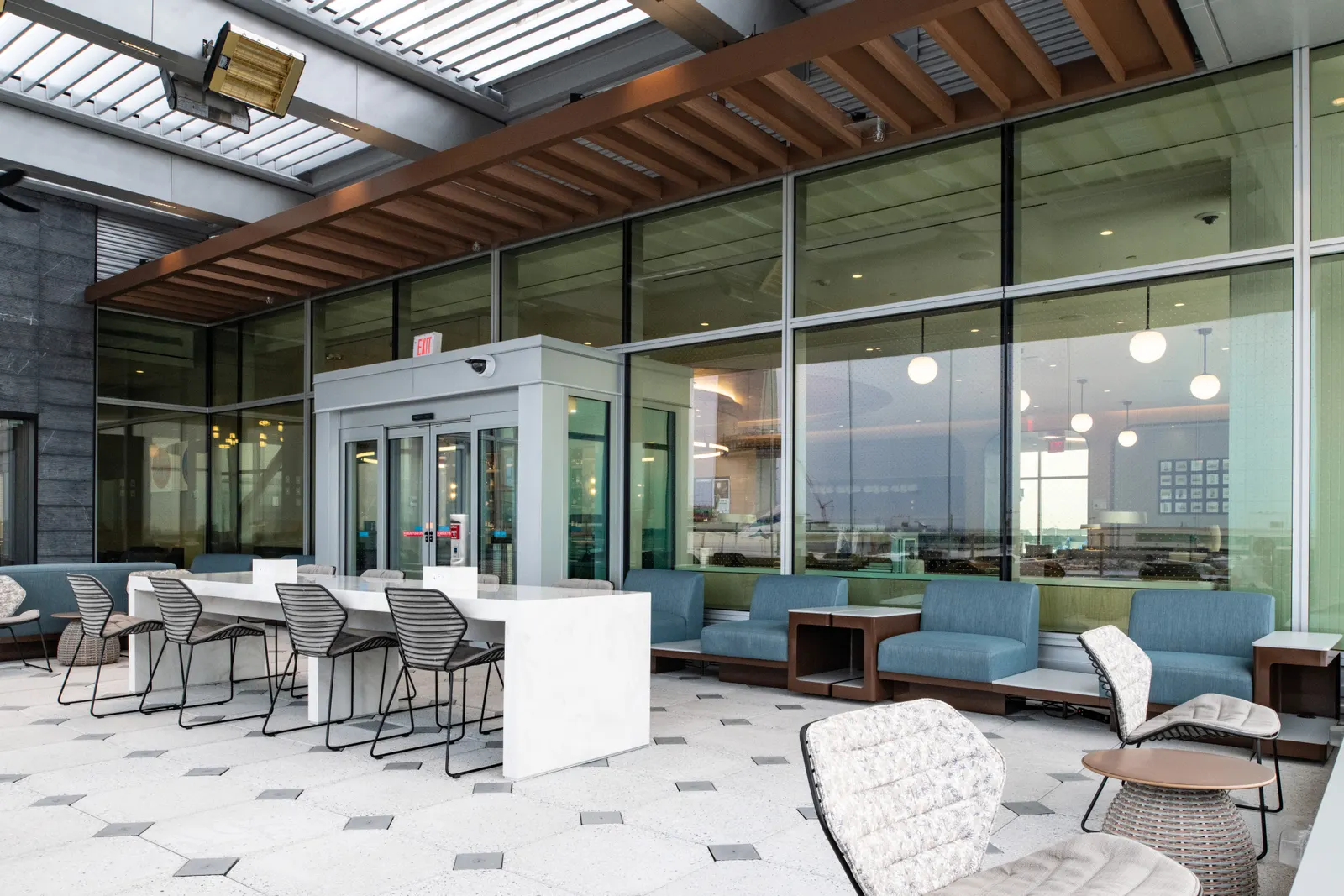 Covered Sky Deck seating area in the Delta Sky Club at JFK.