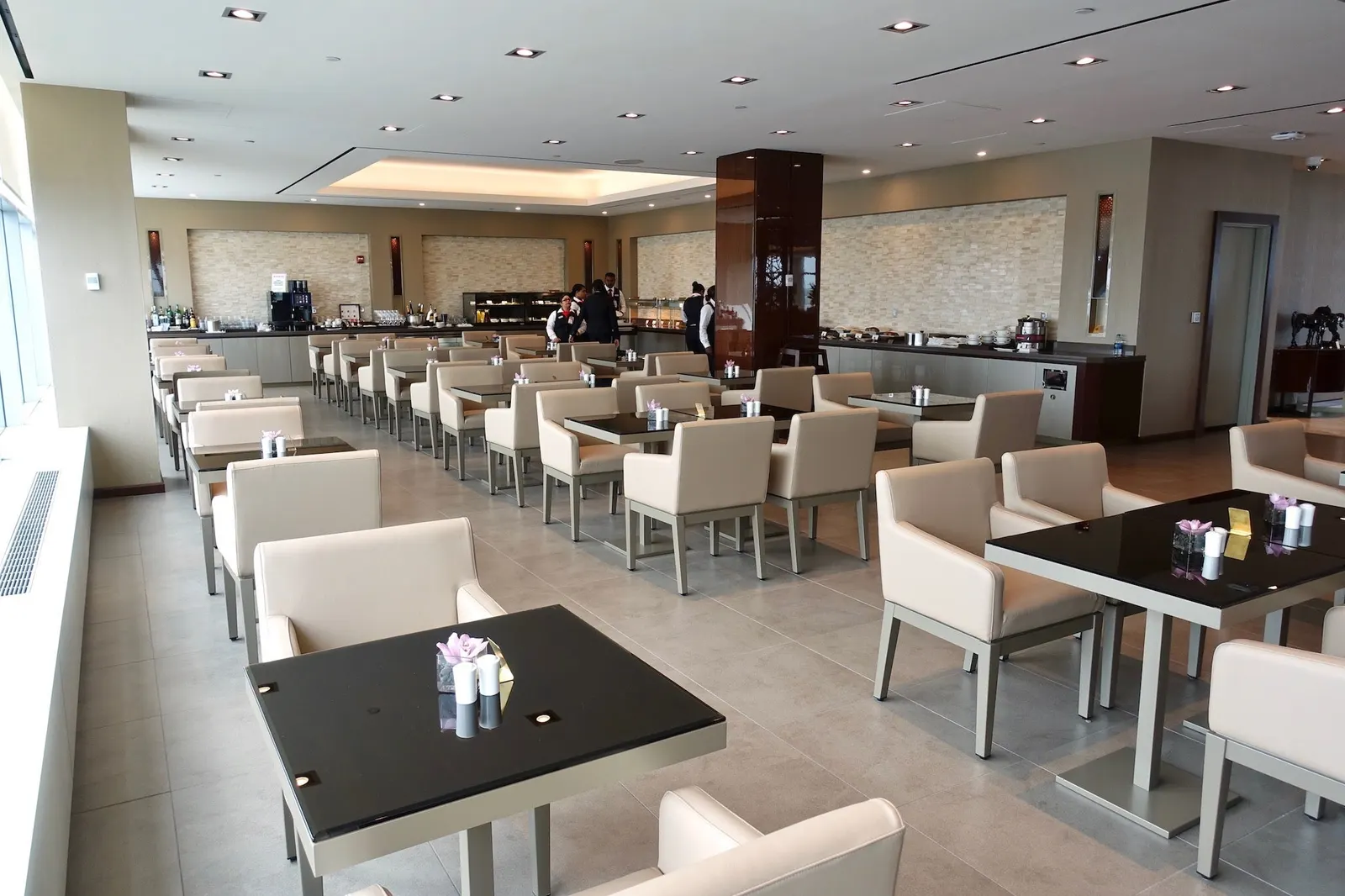 Dining area interior in the Emirates Lounge at New York JFK Terminal 4.