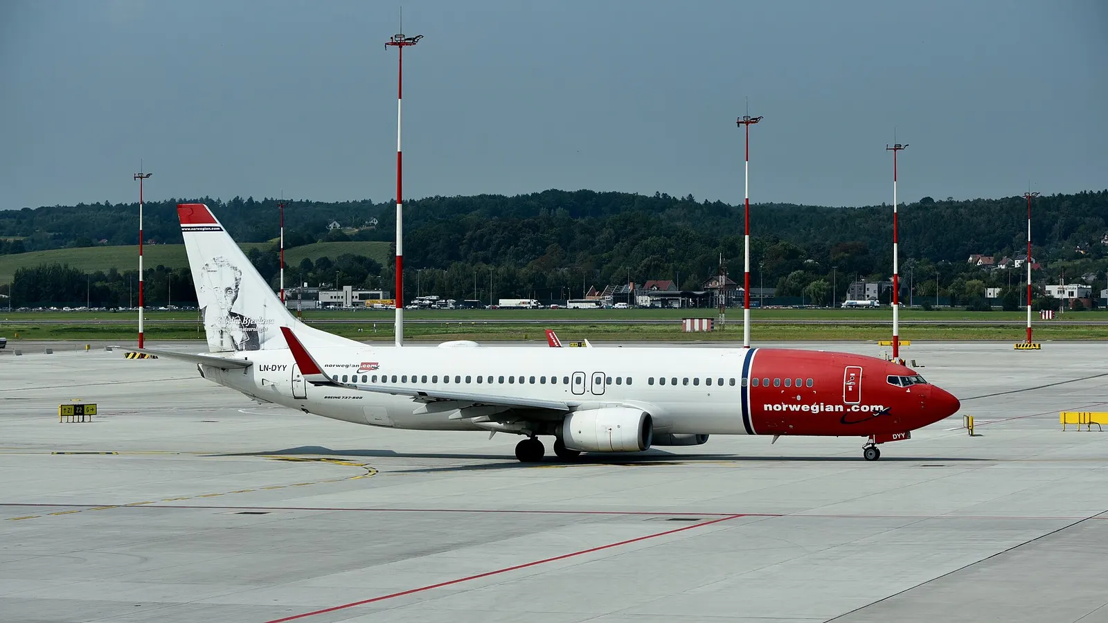 Norwegian Air Shuttle Boeing 737-8JP LN-DYY taxiing away from the terminal at Kraków John Paul II International Airport (KRK/EPKK), Krakow, Poland, at the commencement of its departure for Copenhagen Airport , Kastrup (CPH/EKCH), Denmark, as D83563