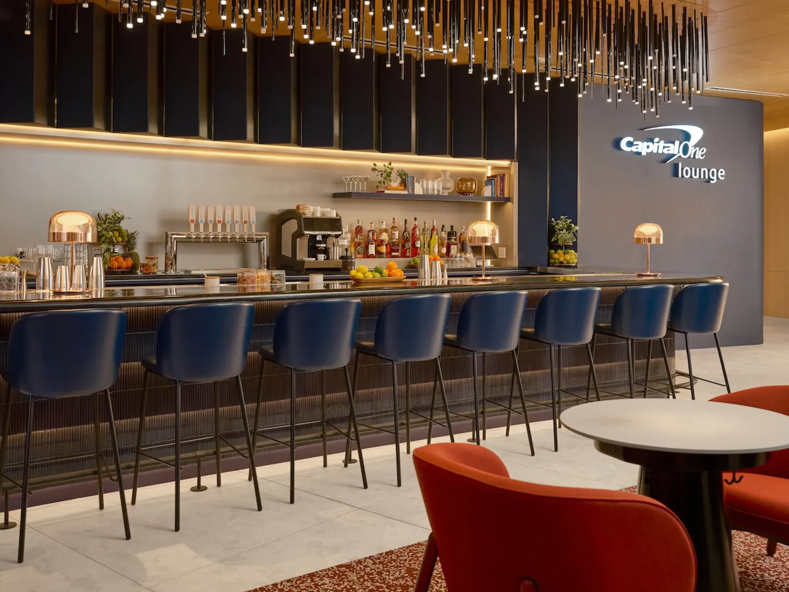 Seating area in the Capital One Lounge at Las Vegas Harry Reid Airport (LAS).