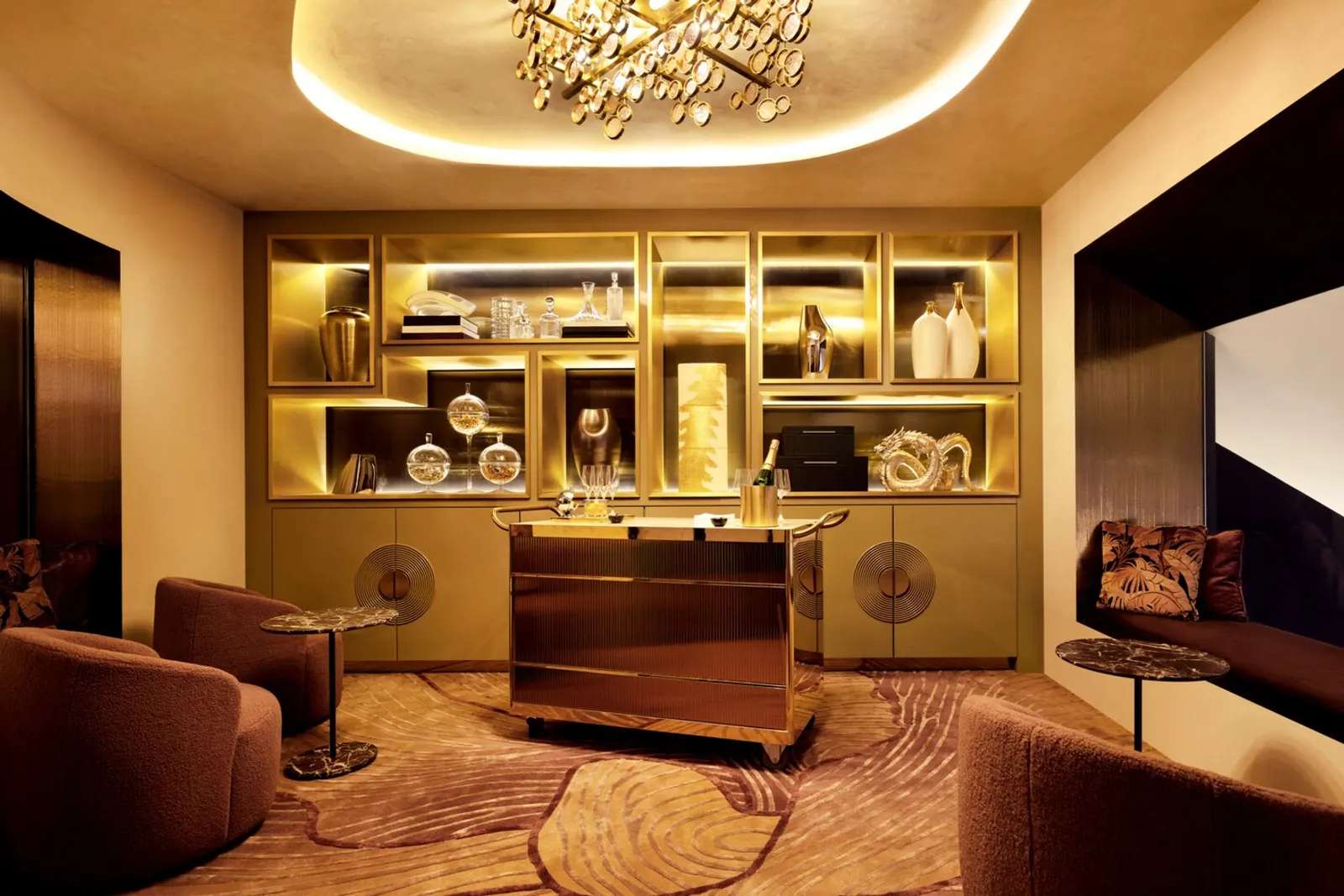 Champagne parlor seating with warm lighting in the Chase Sapphire Lounge by The Club at Las Vegas (LAS).