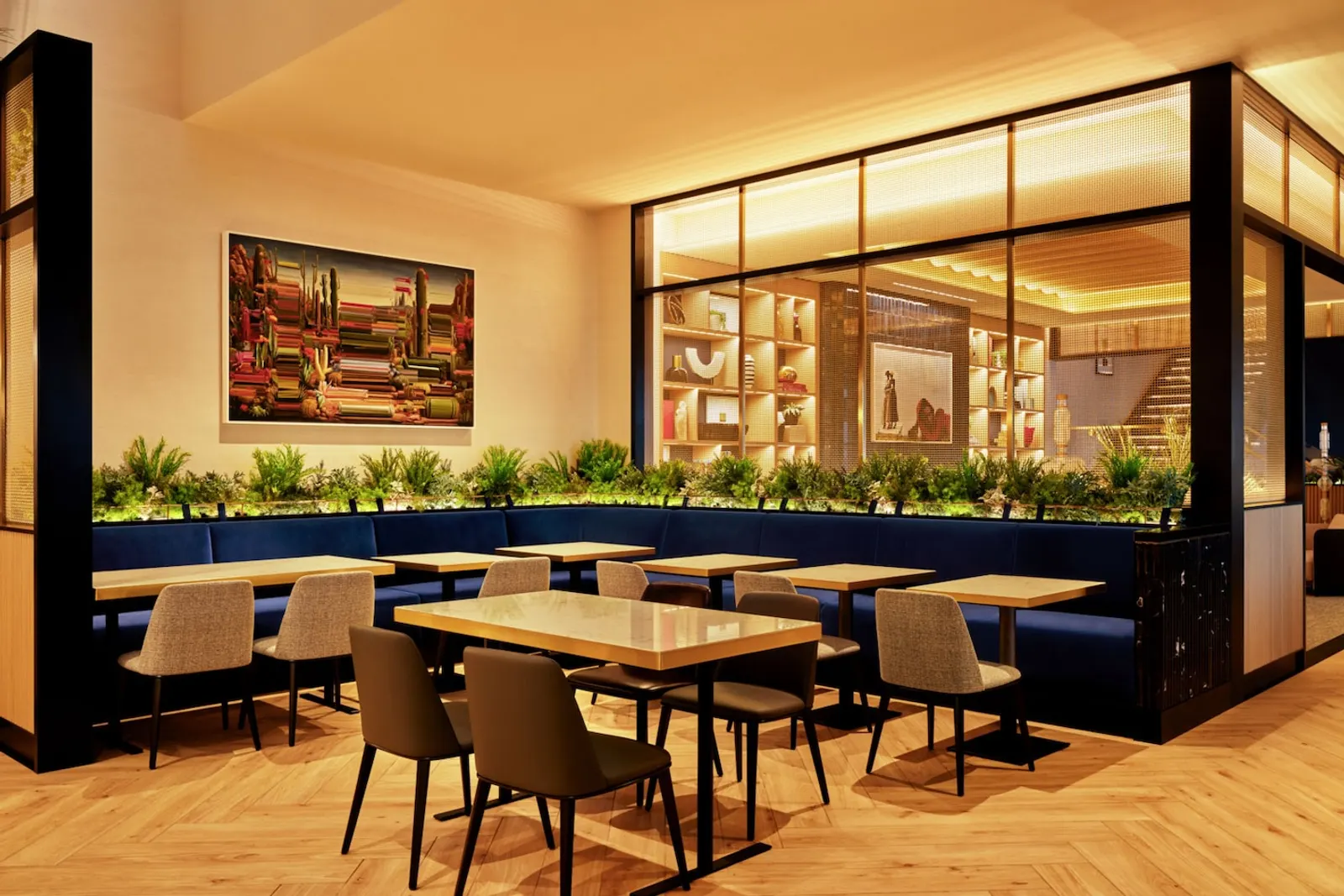 Dining area with self-serve stations and lounge seating in the Chase Sapphire Lounge at Las Vegas (LAS).