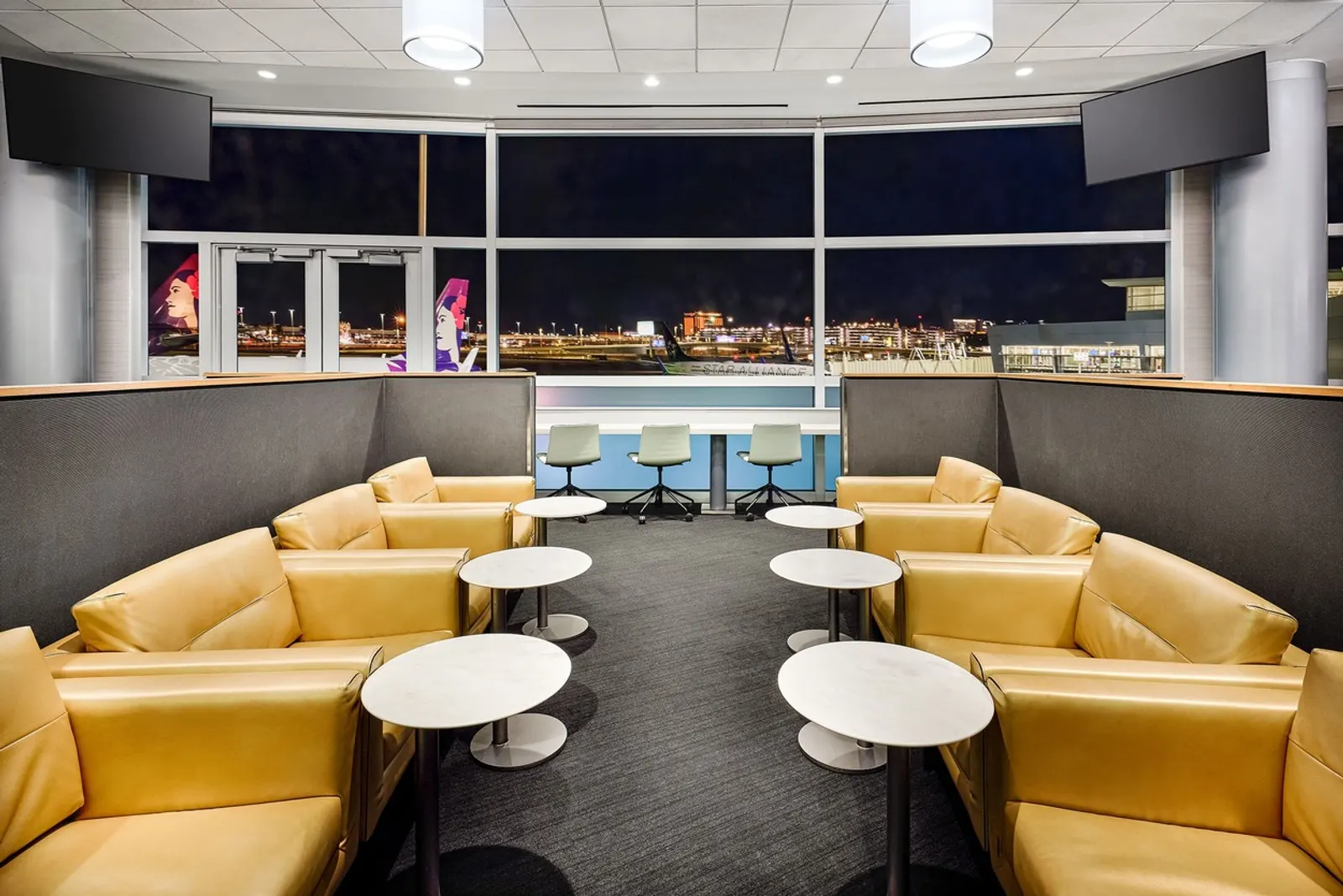 Gold accent seating in The Club at Las Vegas Harry Reid Terminal 1 (LAS).