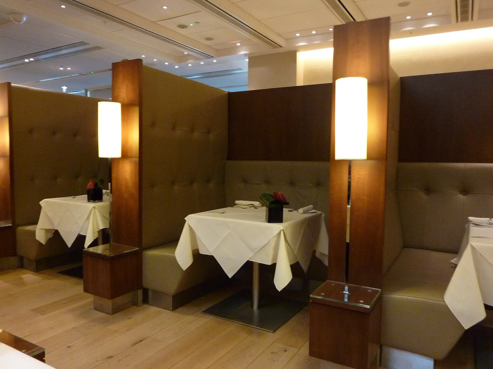 Restaurant seating inside the British Airways Galleries First Lounge at Heathrow Terminal 5 (LHR).