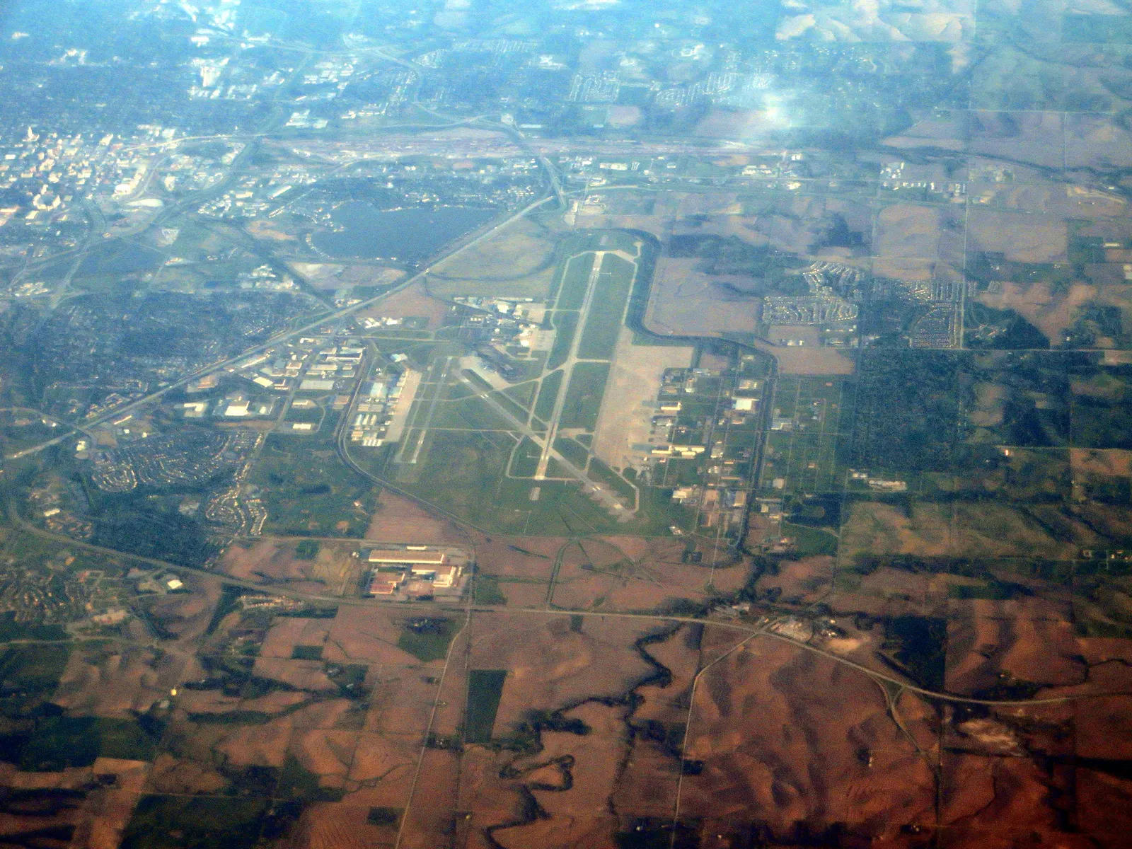 Lincoln Airport commercial ramp and terminal from above on 17 May 2014