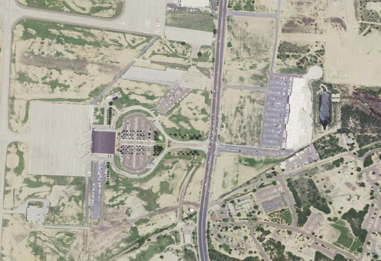 USGS NAIP crop of the Laredo International Airport passenger terminal, circular parking loop, and Bob Bullock Loop.