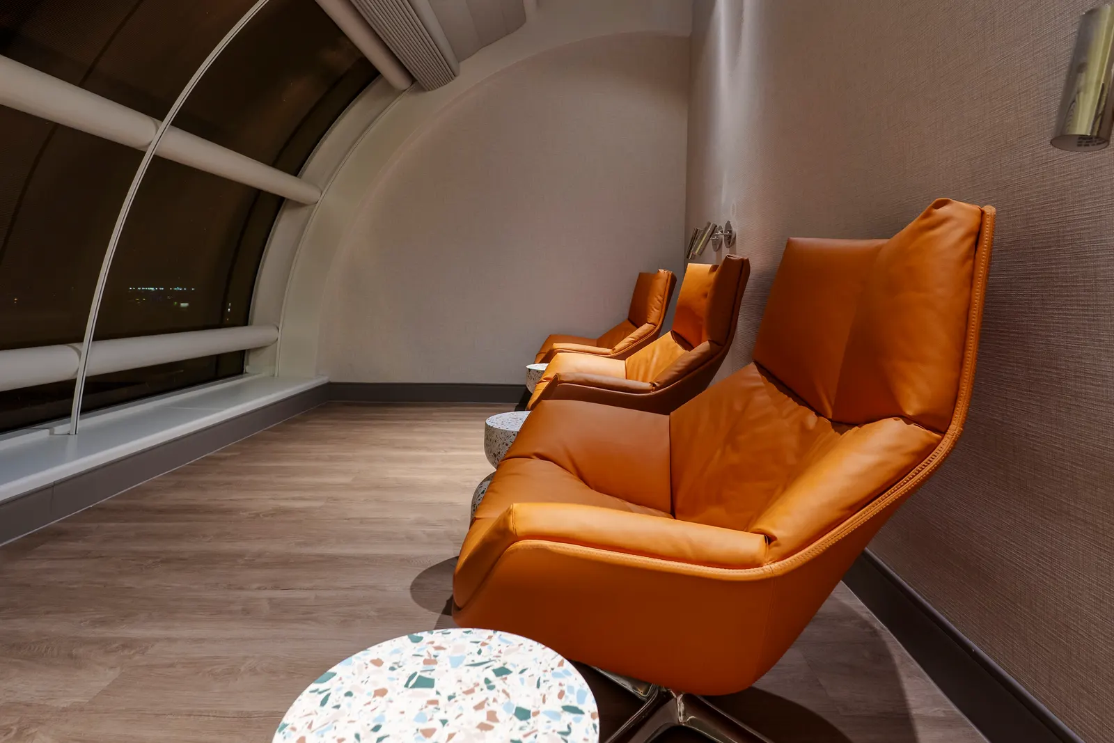 Relaxation seating in The Club at Orlando International Terminal B (MCO).