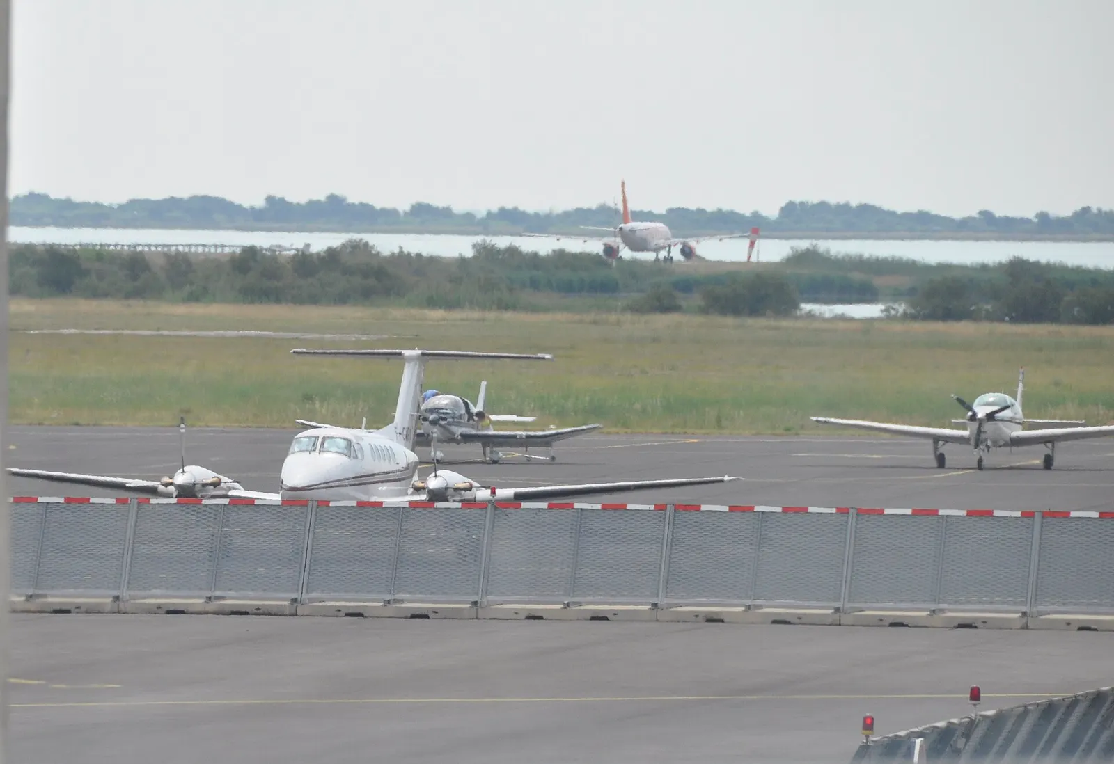 The passenger terminal at Montpellier Méditerranée, seen from the forecourt on 4 July 2009, with the control tower to the right.