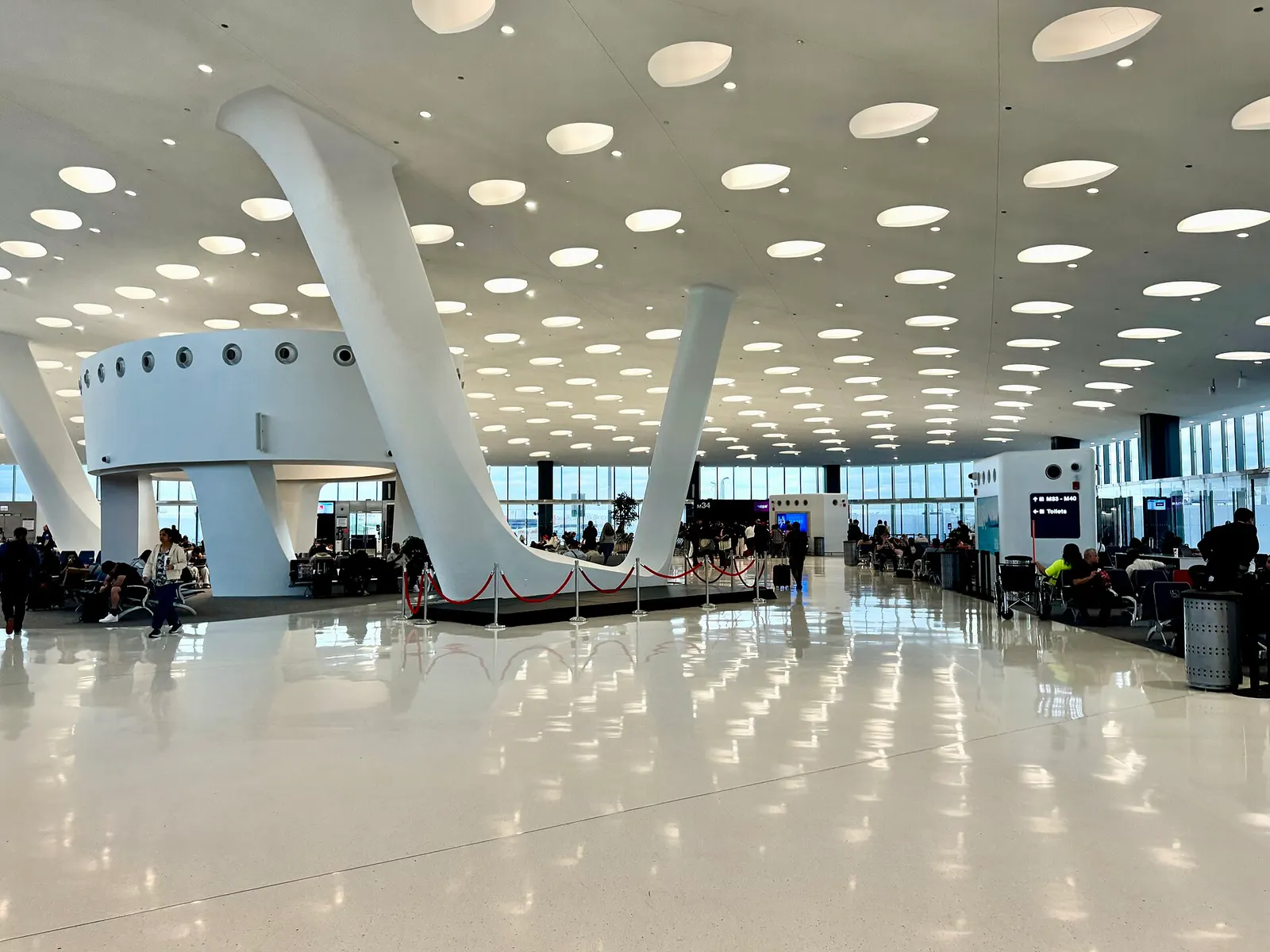 Built in 1989-1993, this Contemporary and Postmodern-style building was designed by Ralph Johnson of Perkins + Will Architects to serve as an international terminal for Chicago O’Hare International Airport, replacing the former International Terminal within the original Terminal 1. The building was
