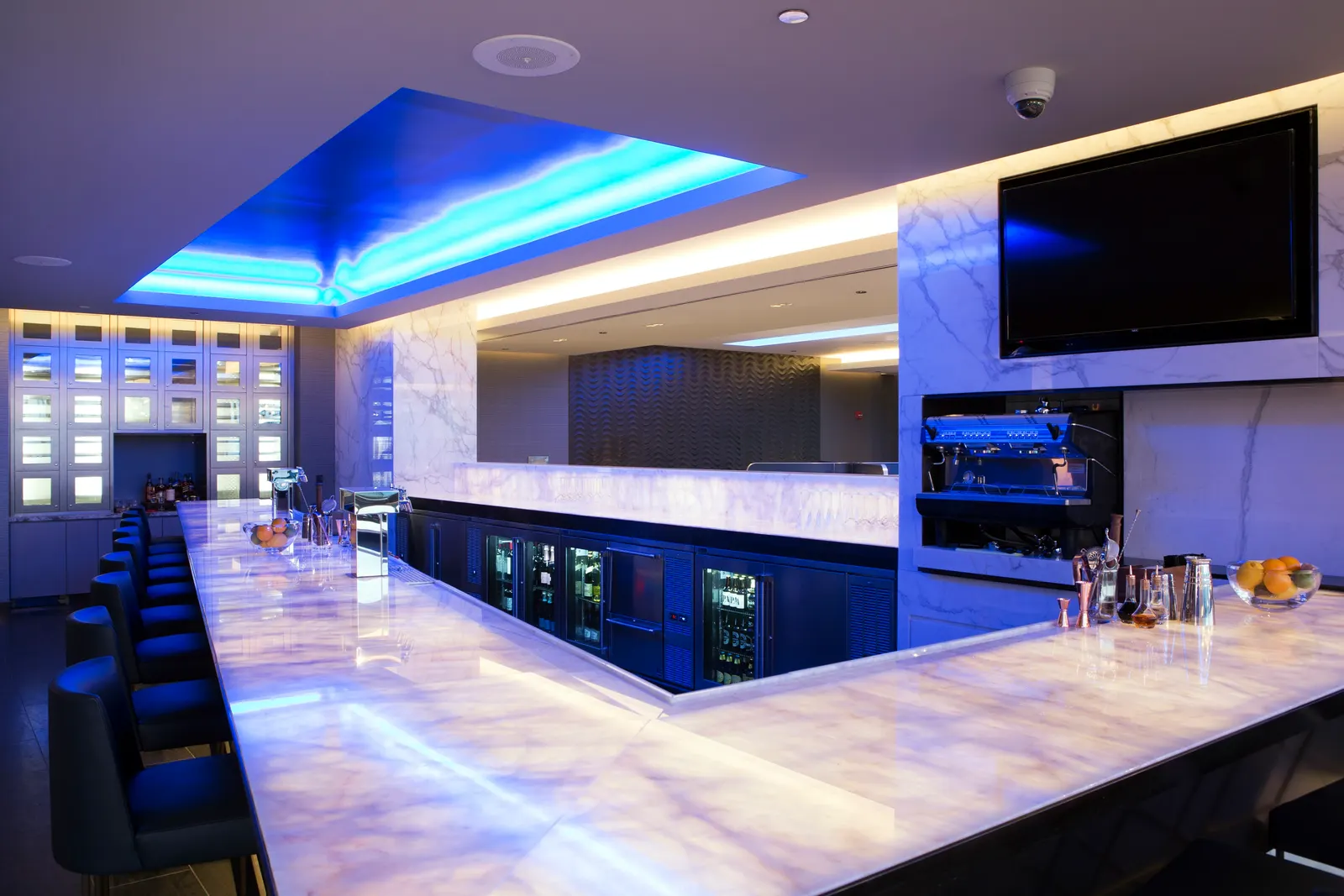 Bar seating in the renovated United Polaris Lounge at Chicago O'Hare (ORD).