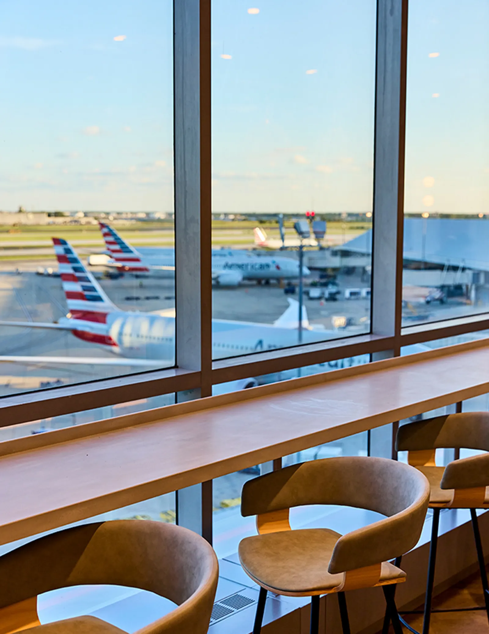Window seating in the American Airlines Flagship Lounge at Philadelphia A-West (PHL).