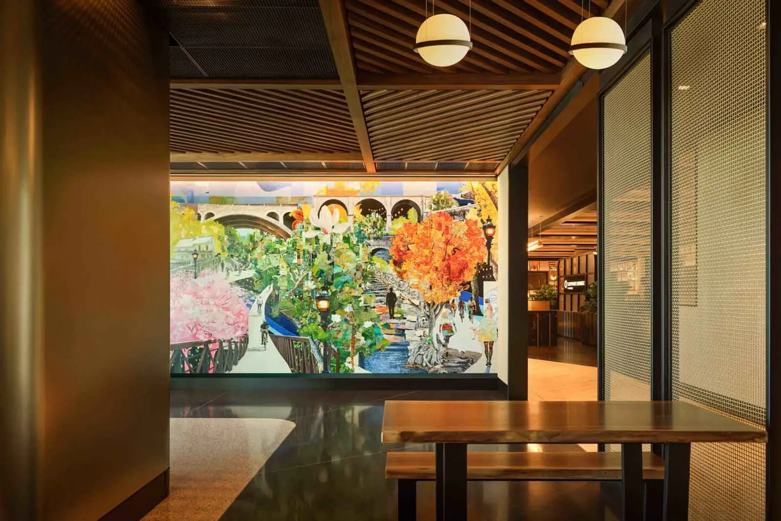 Portals and Pathways mural by James Burns in the Chase Sapphire Lounge by The Club at Philadelphia International Airport (PHL).