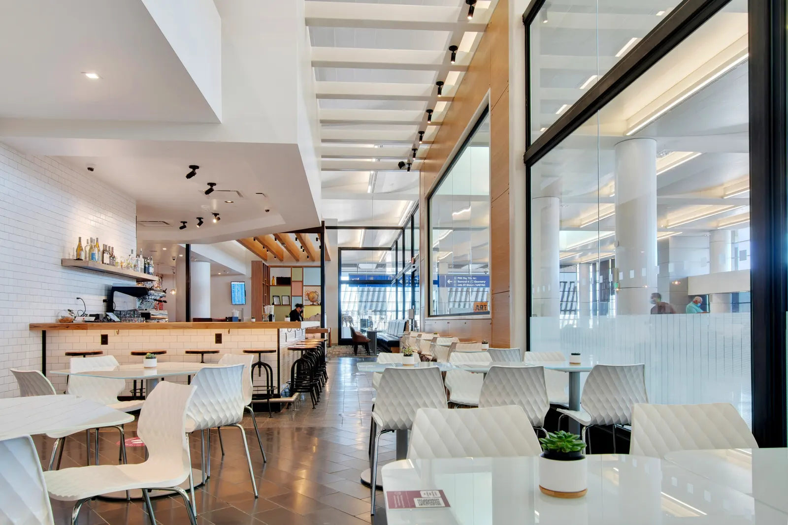 Dining area in the Escape Lounge at Phoenix Sky Harbor Terminal 3 (PHX).