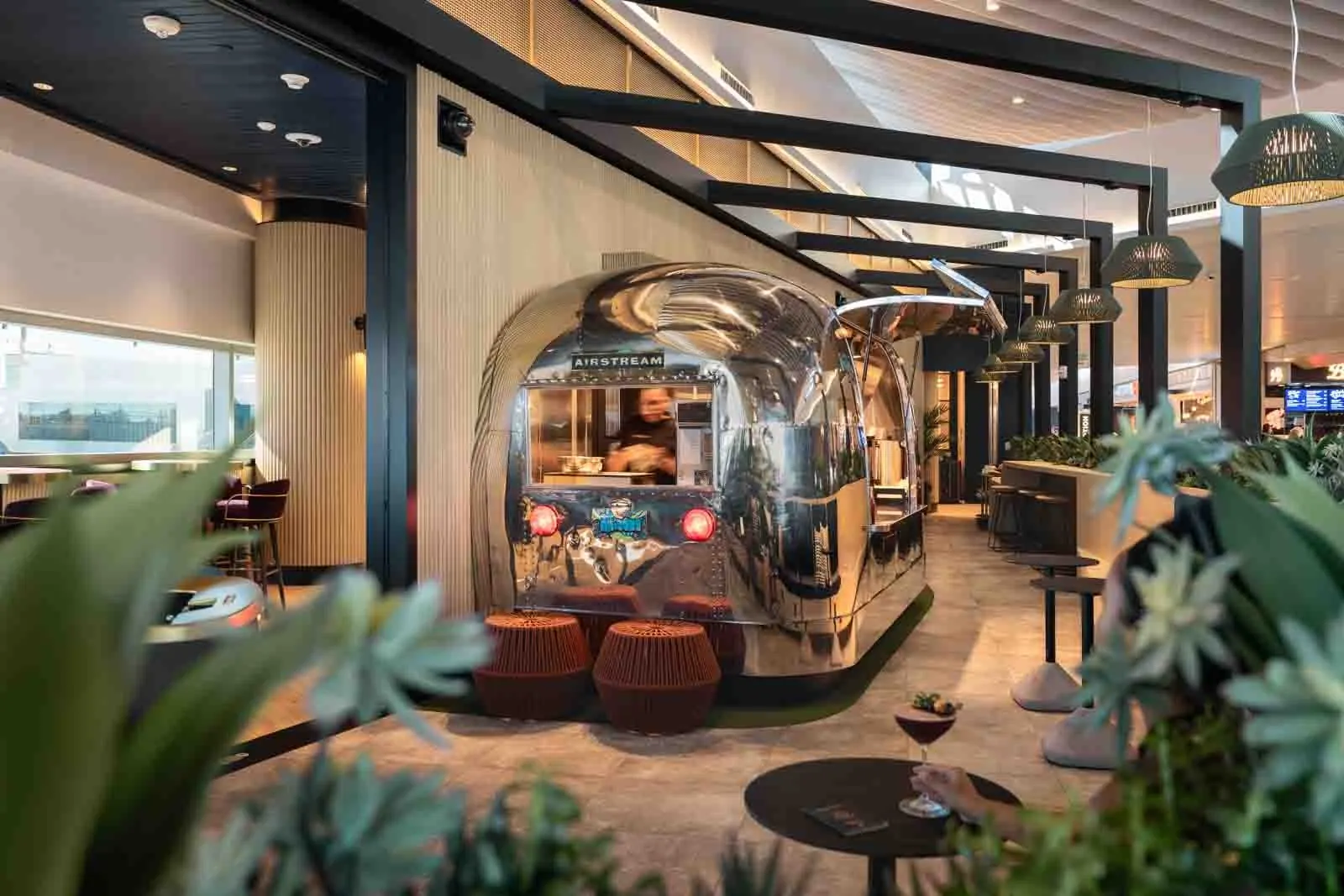 Refurbished Airstream food truck on the indoor patio terrace of the Chase Sapphire Lounge by The Club at Phoenix Sky Harbor (PHX).