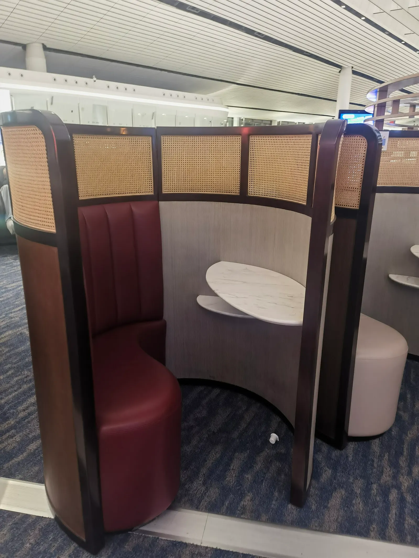Seating area inside the CHUM VIP Lounge at Beijing Daxing International Airport.