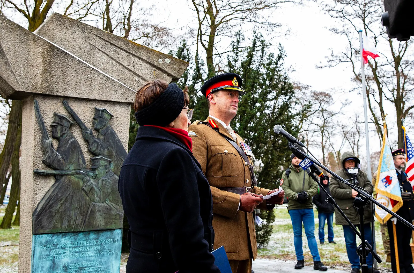 U.S. Army V Corps Forward Deputy Commanding General Maj. Gen. Ollie Kingsbury speaks and joins the Poznan community laying wreaths to commemorate the 105th anniversary of the Battle of Ławica, Jan. 6, 2024, at Poznań–Ławica Henryk Wieniawski Airport in Poznan, Poland. Celebrating Poland's historical