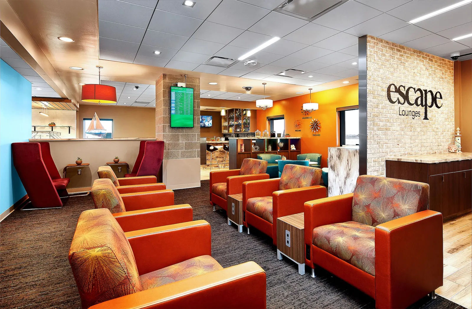 Lounge seating area in the Escape Lounge at Rhode Island T.F. Green International Airport (PVD).