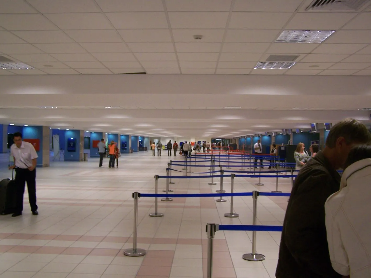 Interior of the Rhodes Diagoras passenger terminal with check-in and passenger hall.