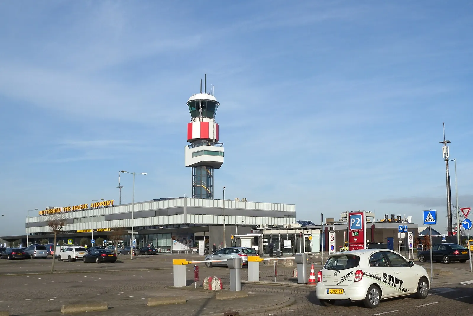 Rotterdam The Hague Airport terminal building and control tower seen from Airportplein.