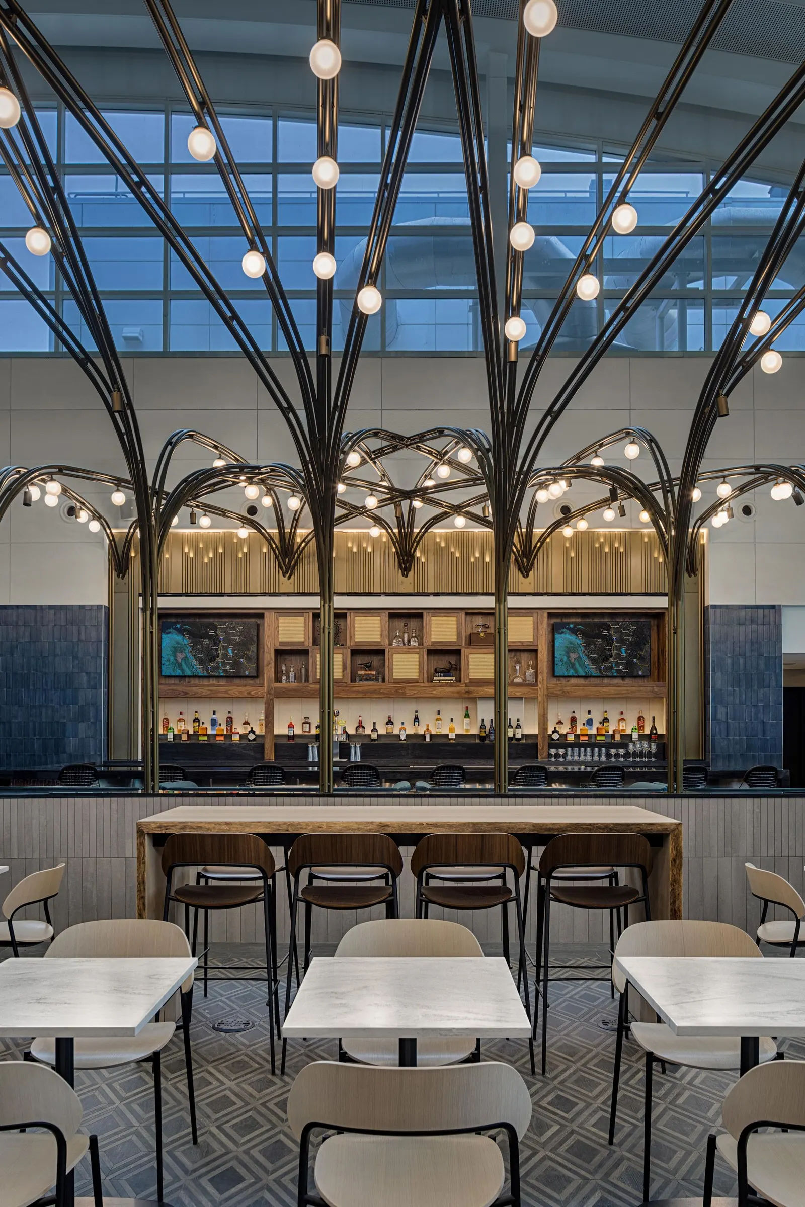 Axial view of the bar area in the Centurion Lounge at Seattle-Tacoma International Airport (SEA).