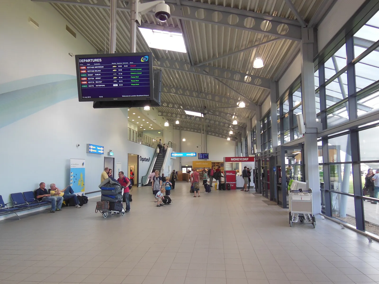 The interior of Southend Airport terminal building, looking north from checkin to arrivals. For more information, see Wikipedia article Southend Airport .