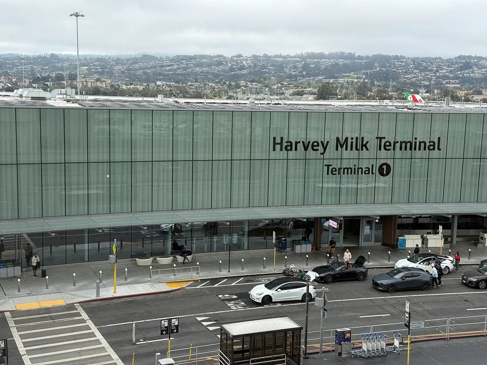 Harvey Milk Terminal 1 façade at San Francisco International Airport, seen from AirTrain SFO in August 2025