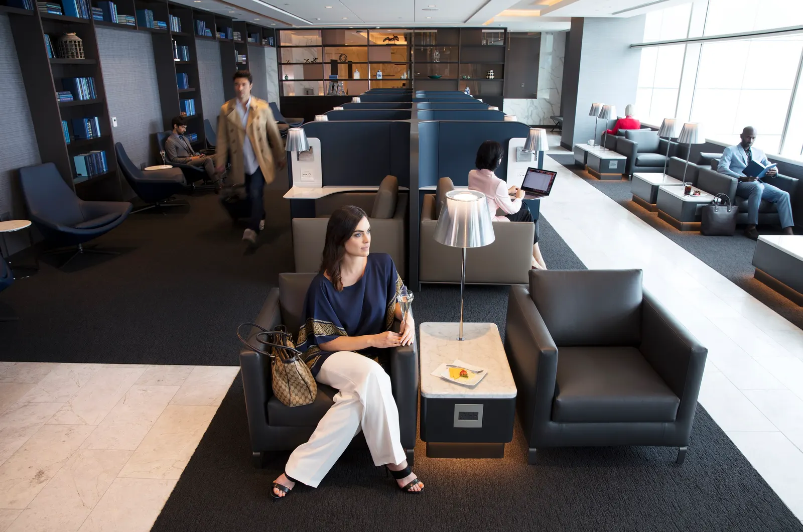 Wide interior overview of the United Polaris Lounge at San Francisco (SFO).