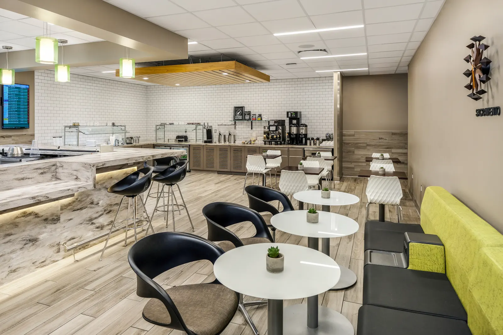 Buffet and coffee station in Escape Lounges Terminal A at Sacramento International Airport (SMF).