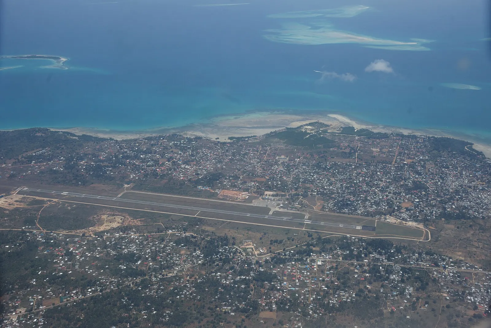 Aerial view of Abeid Amani Karume International Airport on Unguja, looking along the single 18/36 runway